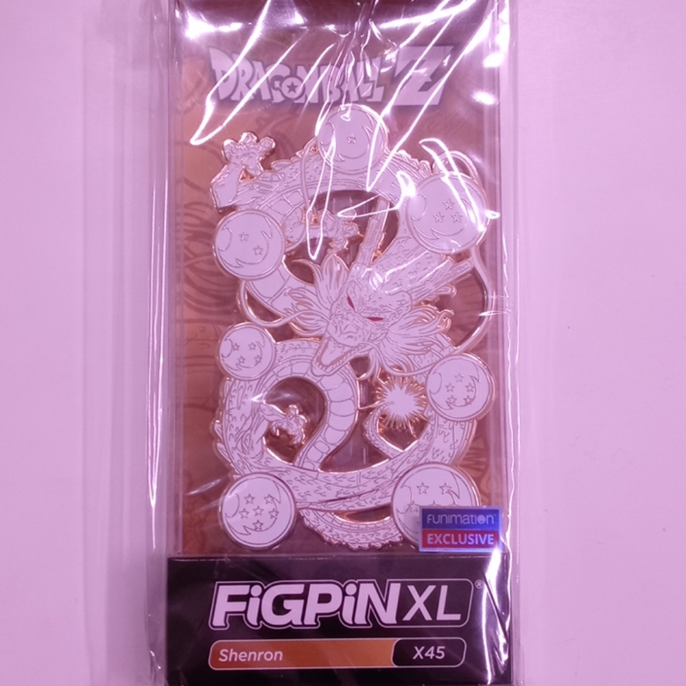 Rare golden shenron fig pin